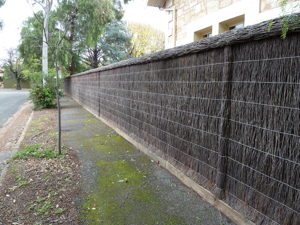 Newly built Brush fence on residential property
