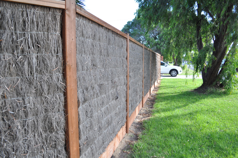 Newly built exposed post Brush fence on residential property
