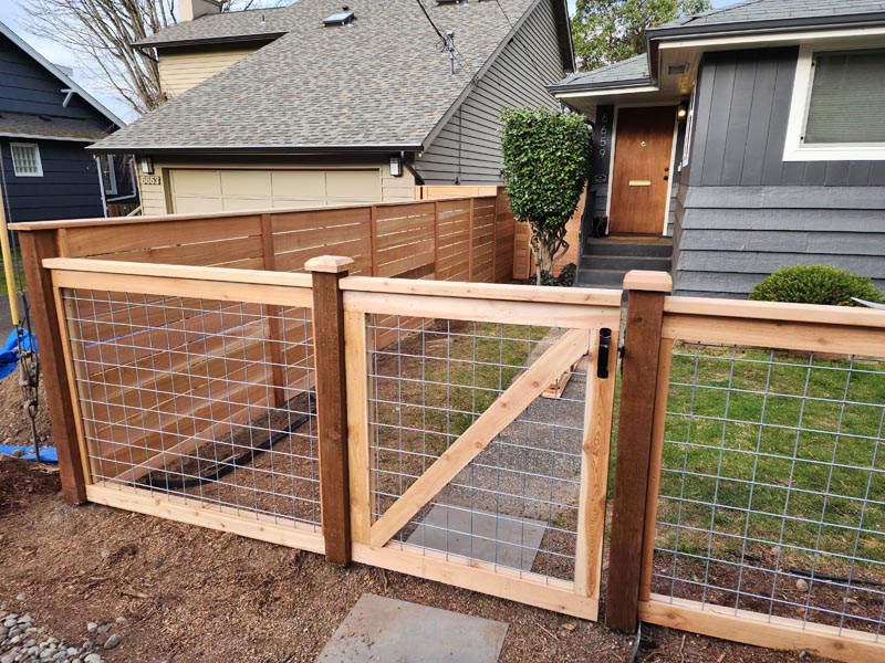 Newly built bullwire fence built on residential property