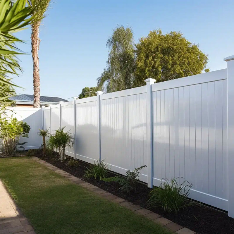 Newly built PVC Hampton style fence on residential property.