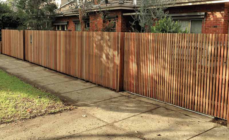 Newly built timber batten fence on residential property.