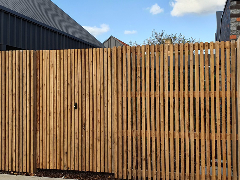 Newly built timber batten fence on residential property.