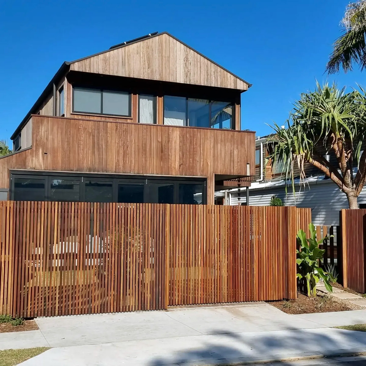 Newly built timber batten fence on residential property.