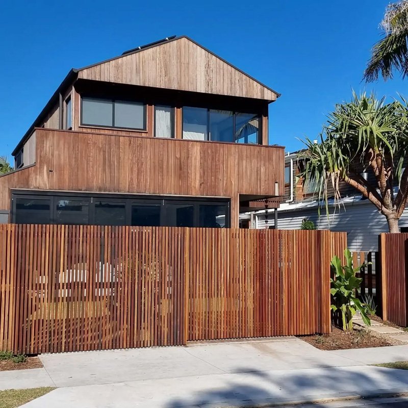 Newly built timber batten fence on residential property.