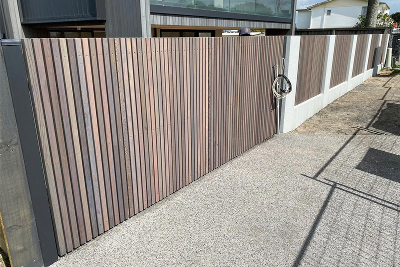 Newly built timber batten fence on residential property.