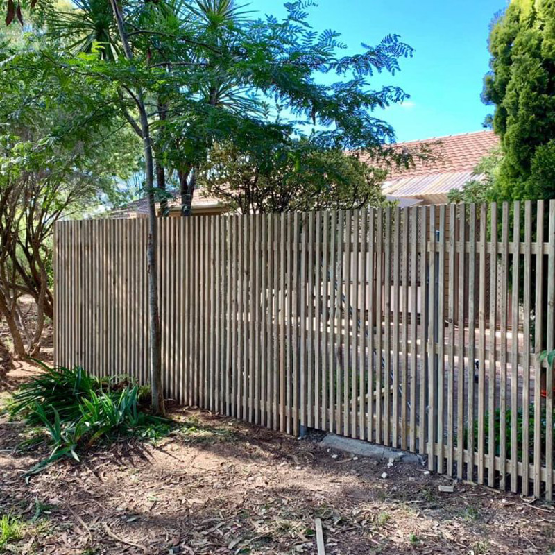 Newly built PVC Hampton style fence on residential property.