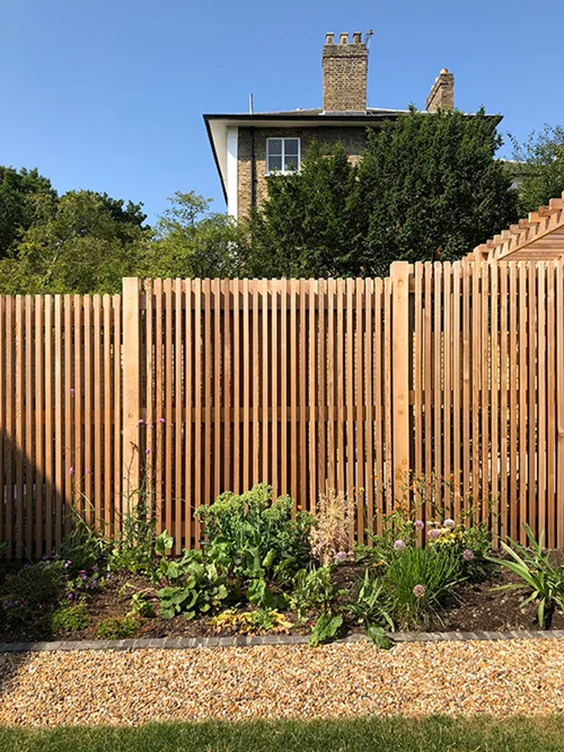 Newly built timber batten fence on residential property.